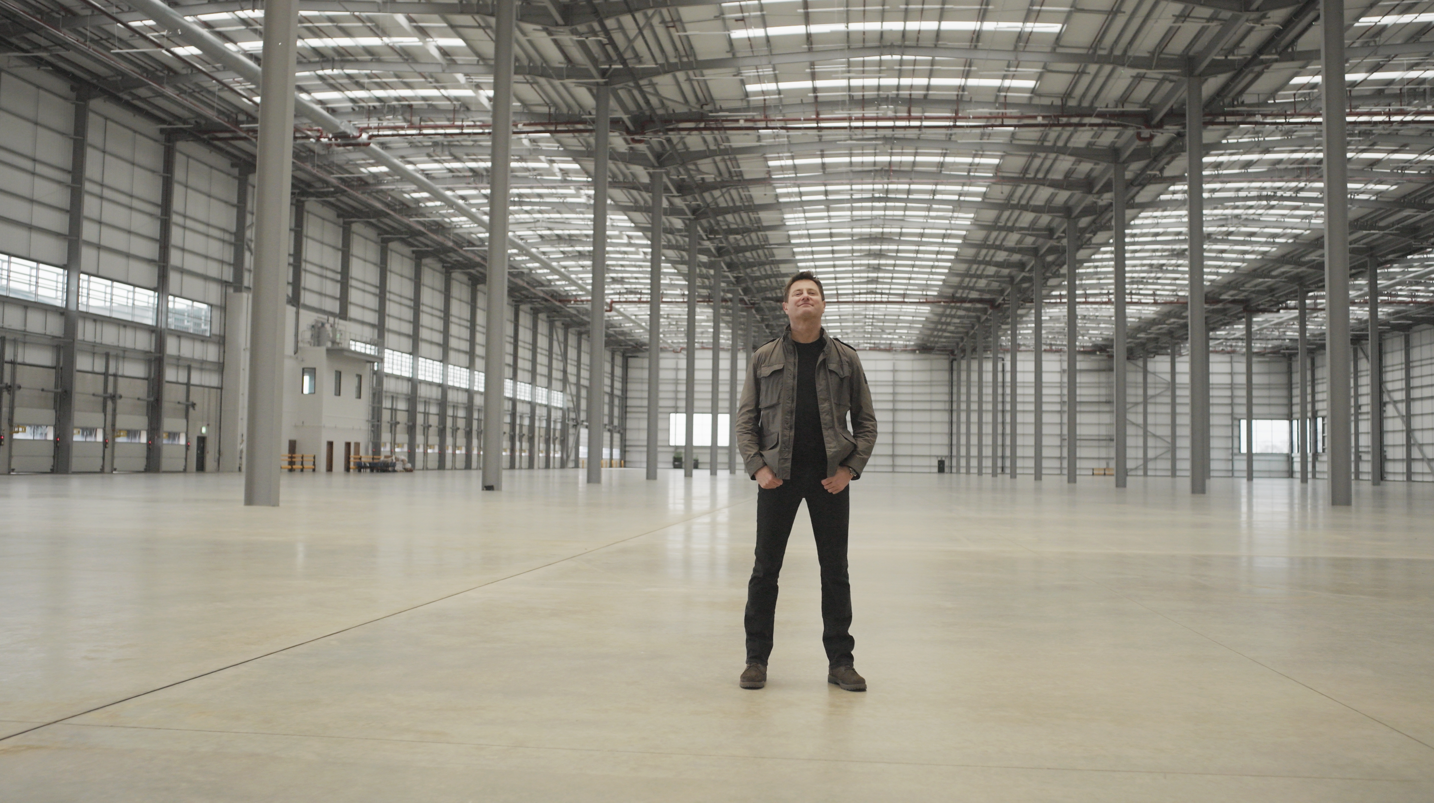George Clarke in a Prolgis warehouse