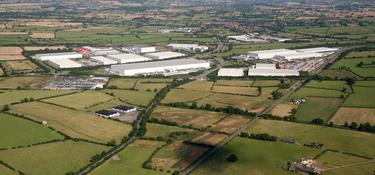 An aerial view of buildings in the countryside