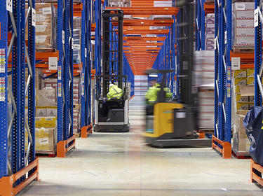 Forklifts and racking inside a Prologis warehouse Forklifts and racking inside a Prologis warehouse