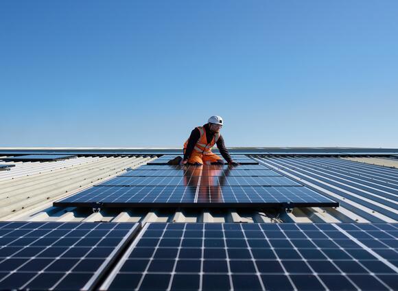 Man fitting solar panels at Prologis Park Kettering DC1